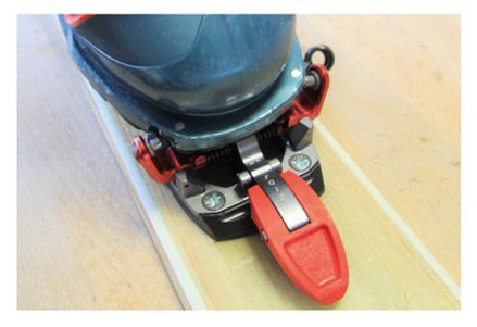 Press down your heel slowly, you will hear a little click, lift up your heel one time, you will hear a second click, you are fitted